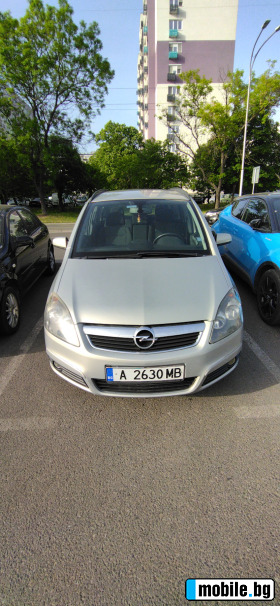     Opel Zafira ~6 000 .