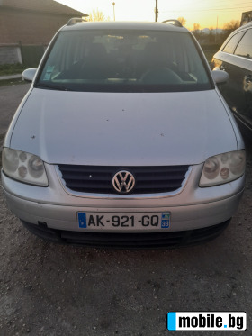     VW Touran ~5 500 .