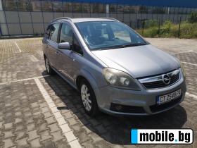    Opel Zafira ~5 900 .