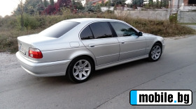     BMW 520 ~8 000 .