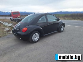 VW New beetle 2.0i  | Mobile.bg   5