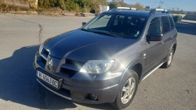 Mitsubishi Outlander, снимка 1