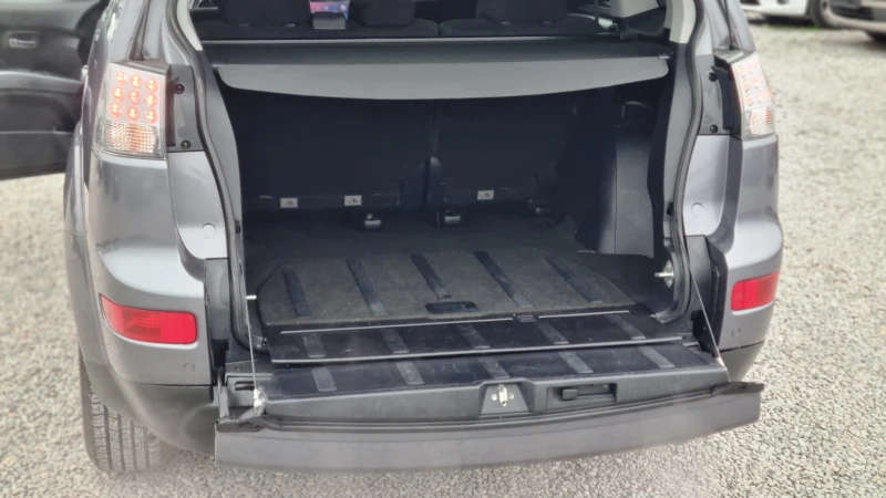 Mitsubishi Outlander 2.4 I 4WD SWISS , снимка 12 - Автомобили и джипове - 52891494