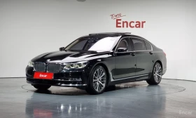 BMW 750 ДИСТРОНИК * ОБДУХВАНЕ * HEAD-UP * B&W, снимка 2
