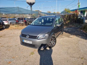 VW Touran 1.6 TDI  SPORT / 7 МЕСТА - 15600 лв. / 7976.15 € - 17727423 1