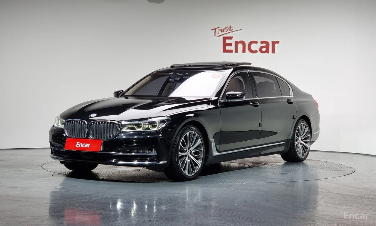 BMW 750 ДИСТРОНИК * ОБДУХВАНЕ * HEAD-UP * B&W, снимка 2 - Автомобили и джипове - 55187626