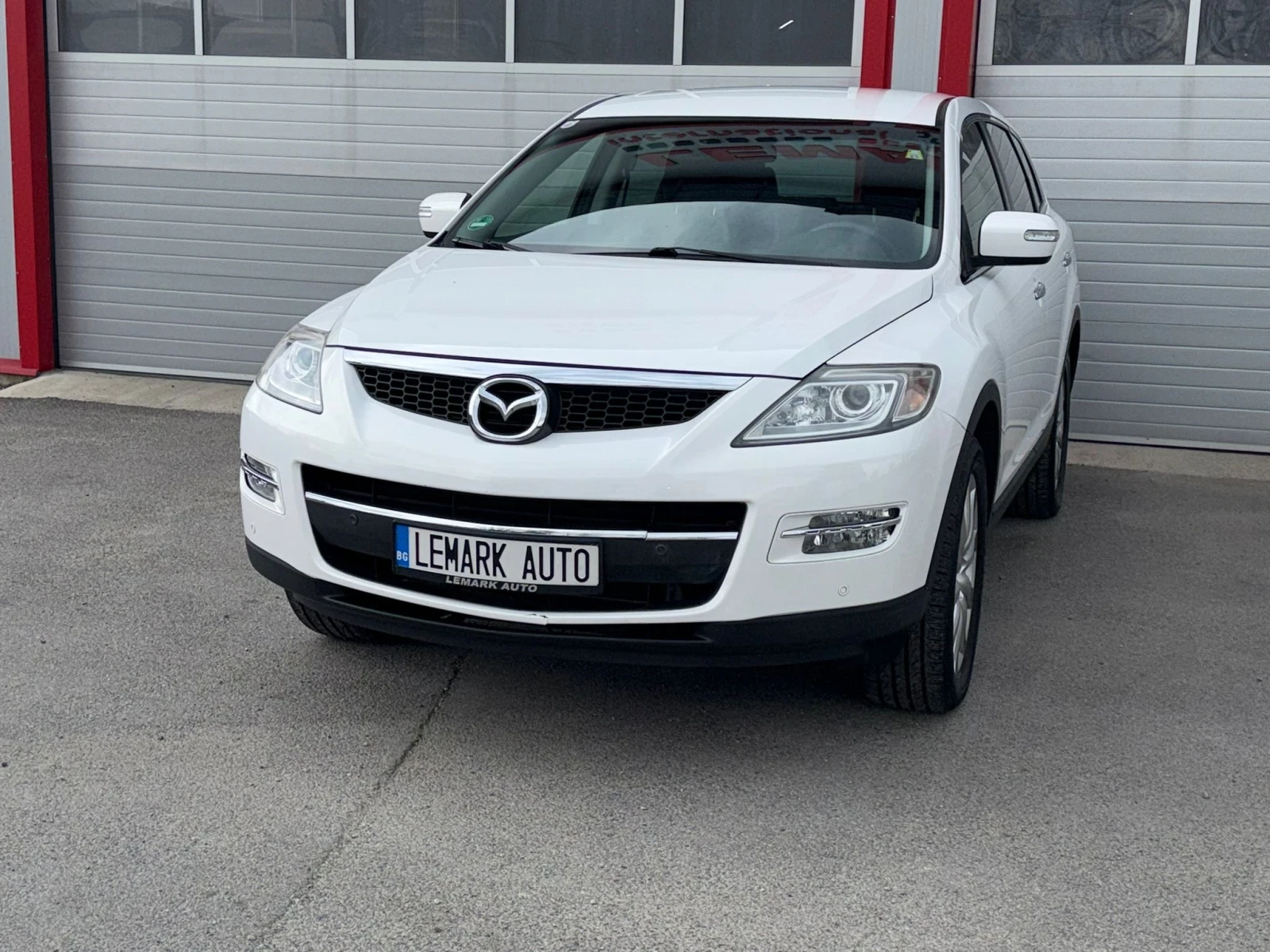 Mazda CX-9 3.7I REVOLUTION AWD AUTOMATIK KEY LESS NAVI BOSE, снимка 2 - Автомобили и джипове - 54255807