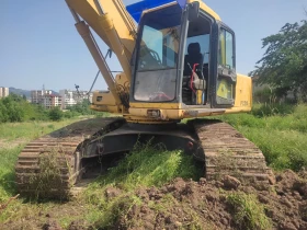      Komatsu 210