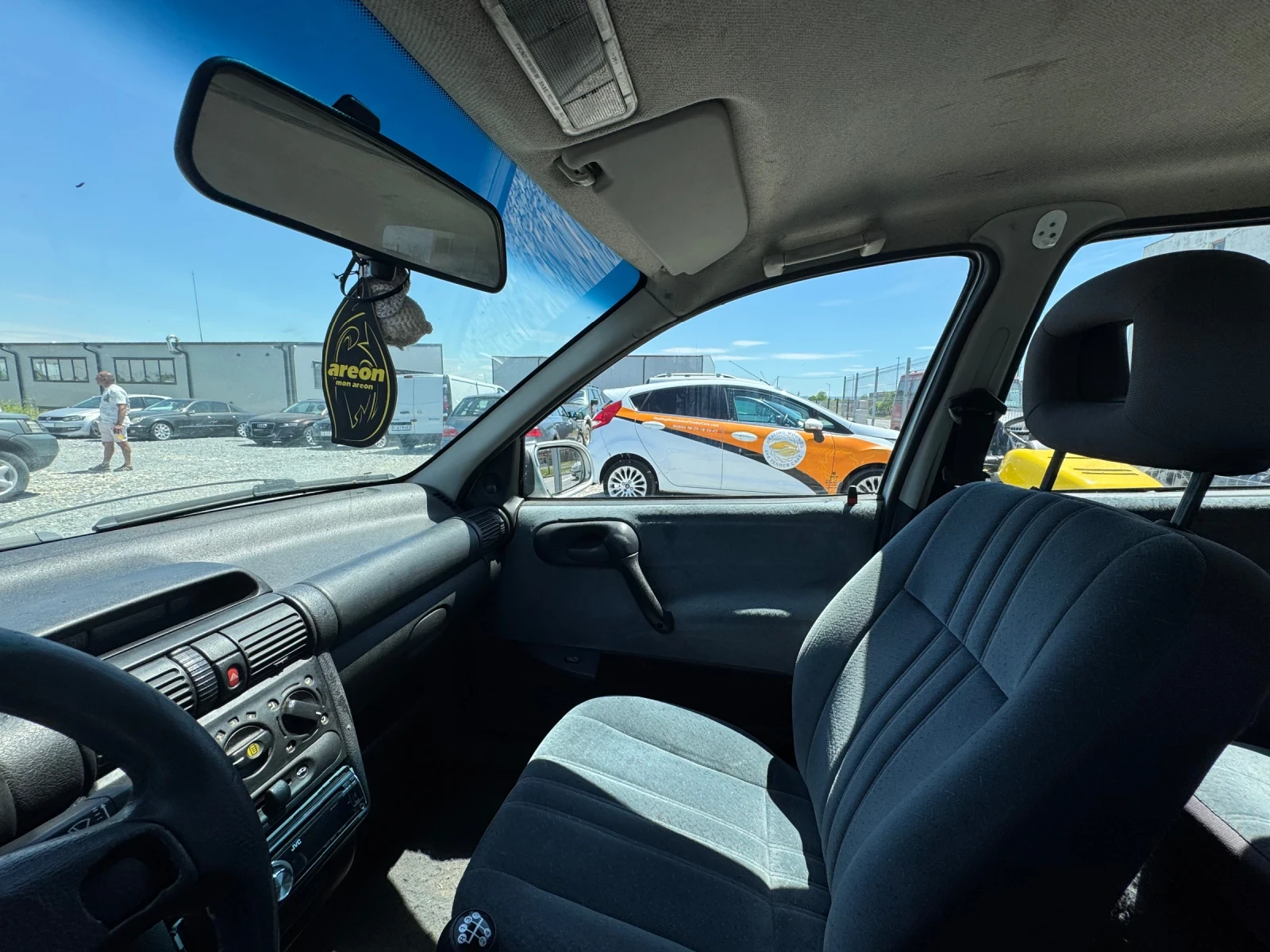 Opel Corsa 1.4 16V, снимка 12 - Автомобили и джипове - 54719348