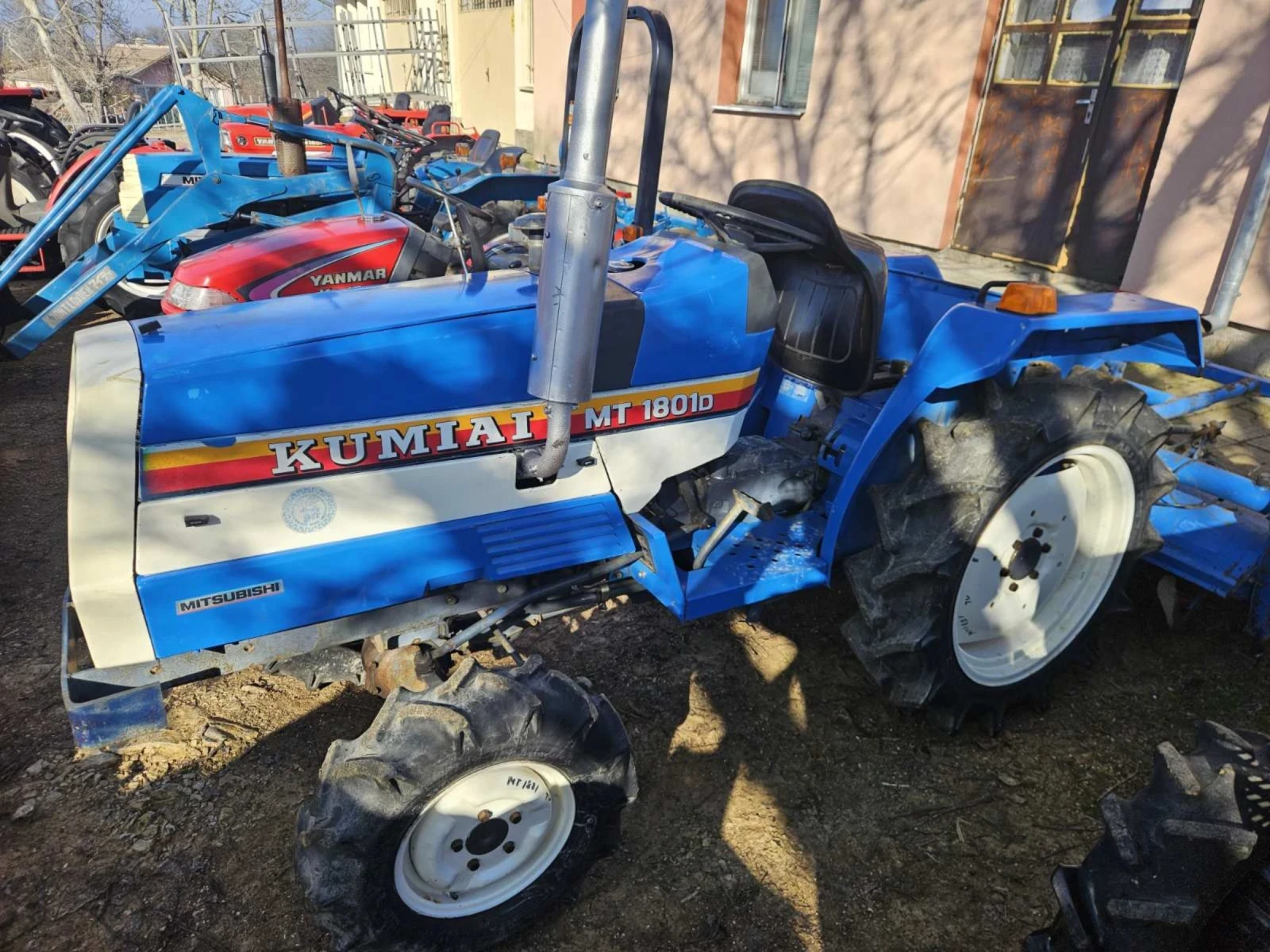 Трактор Mitsubishi