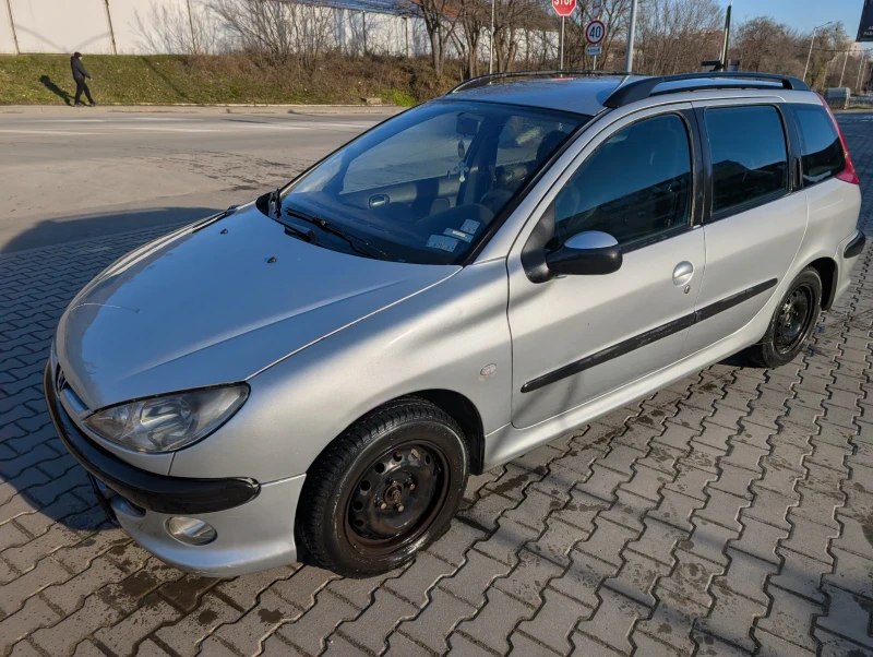 Peugeot 206 1.4i Sw, снимка 10 - Автомобили и джипове - 53303852