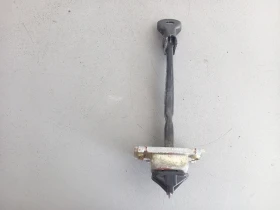 Панта врата ограничителна задна лява Мазда 2 (1)