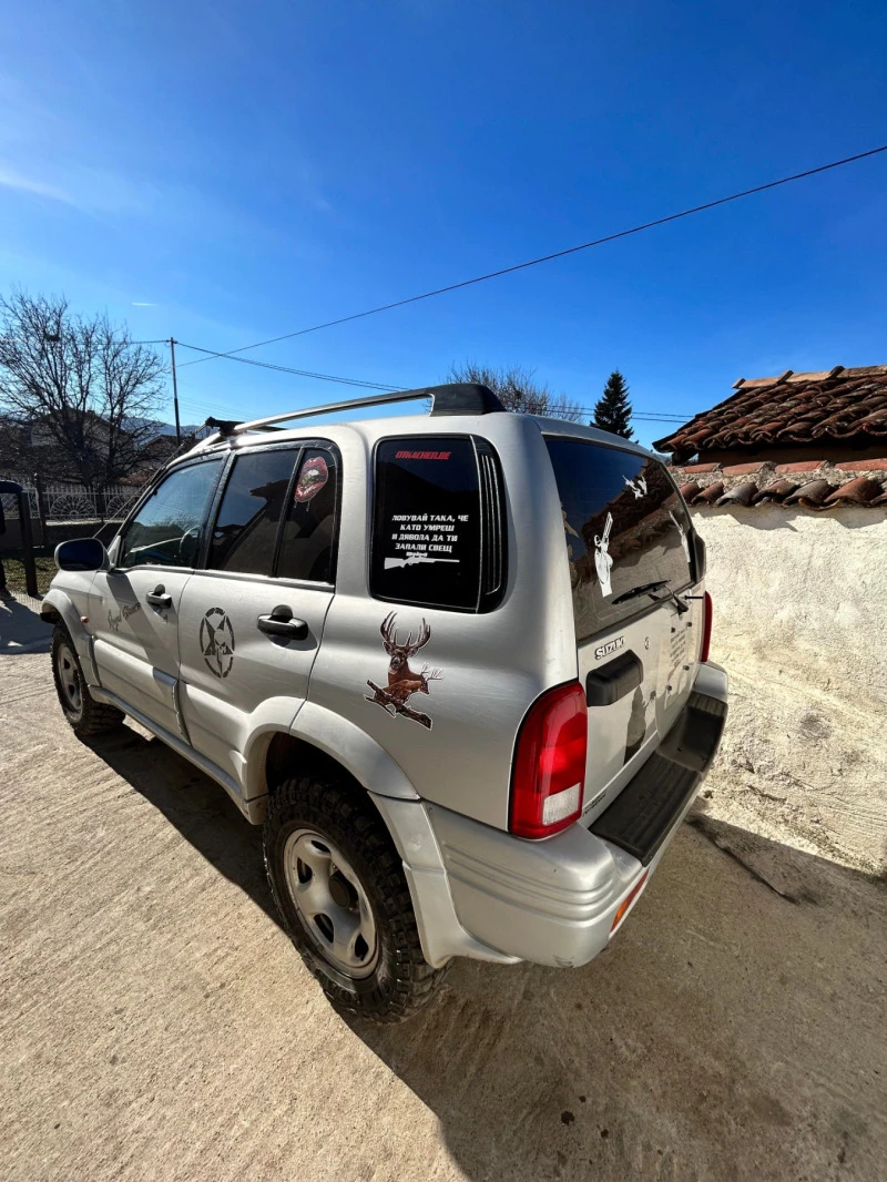 Suzuki Grand vitara 2.0, снимка 10 - Автомобили и джипове - 46802957