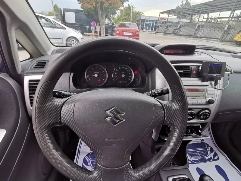 Suzuki Liana 4х4/Bluetooth /ПЕРФЕКТЕН, снимка 10 - Автомобили и джипове - 47448366