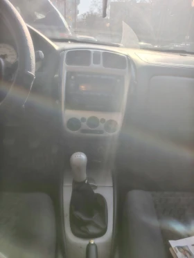 Mazda 323 F, снимка 11