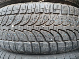 Гуми Зимни 205/70R15, снимка 2 - Гуми и джанти - 47409542