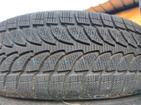 Гуми Зимни 205/70R15, снимка 1 - Гуми и джанти - 47409542