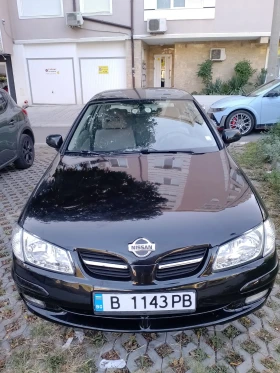 ������ Nissan Almera