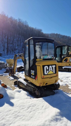 Багер Caterpillar 302.2, снимка 1