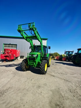      John Deere 6115M