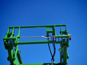      John Deere 6115M