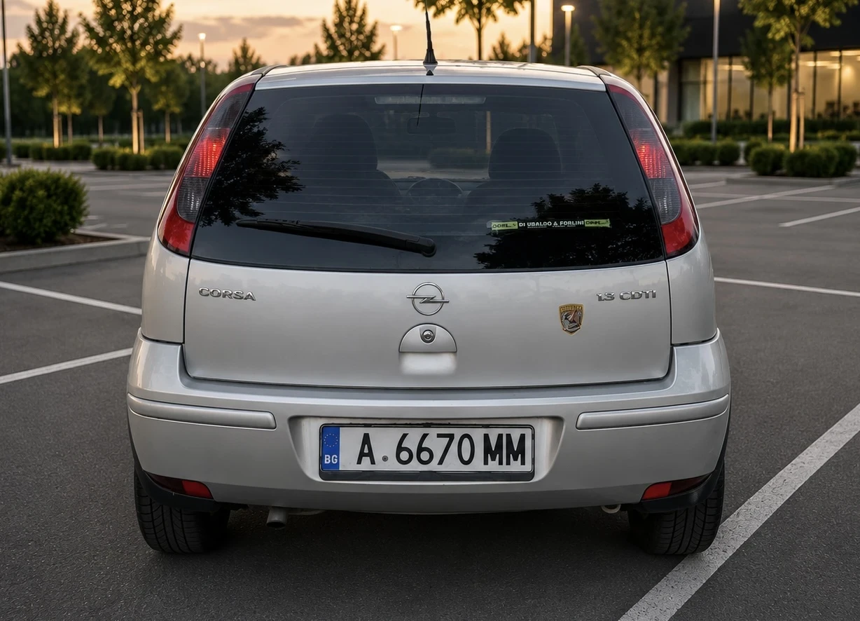 Opel Corsa 1.3 CDTl 2006г, снимка 6 - Автомобили и джипове - 54886722
