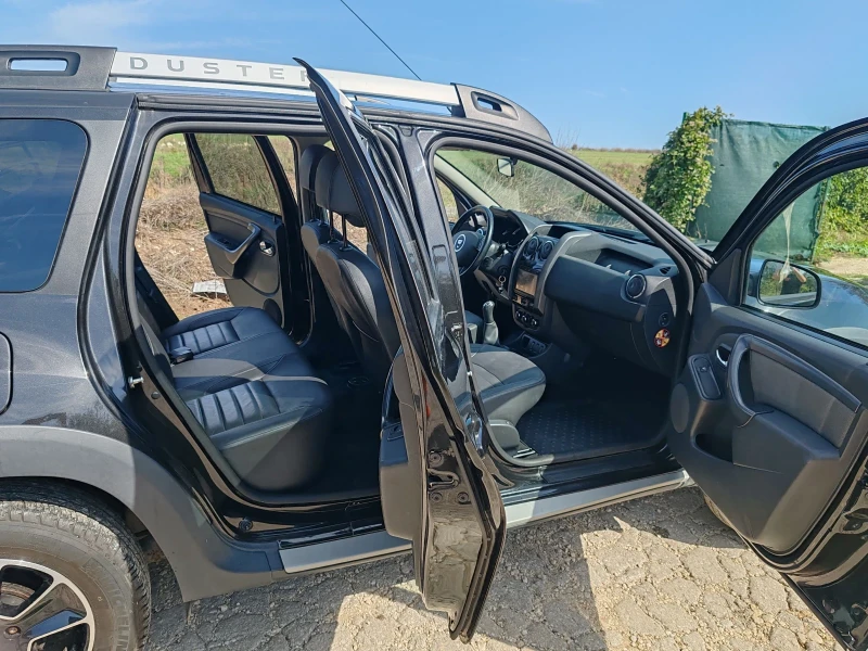 Dacia Duster 1.6i, снимка 8 - Автомобили и джипове - 47595472