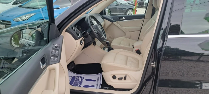 VW Tiguan 2.0TDI 4X4 NAVI, снимка 9 - Автомобили и джипове - 51761699
