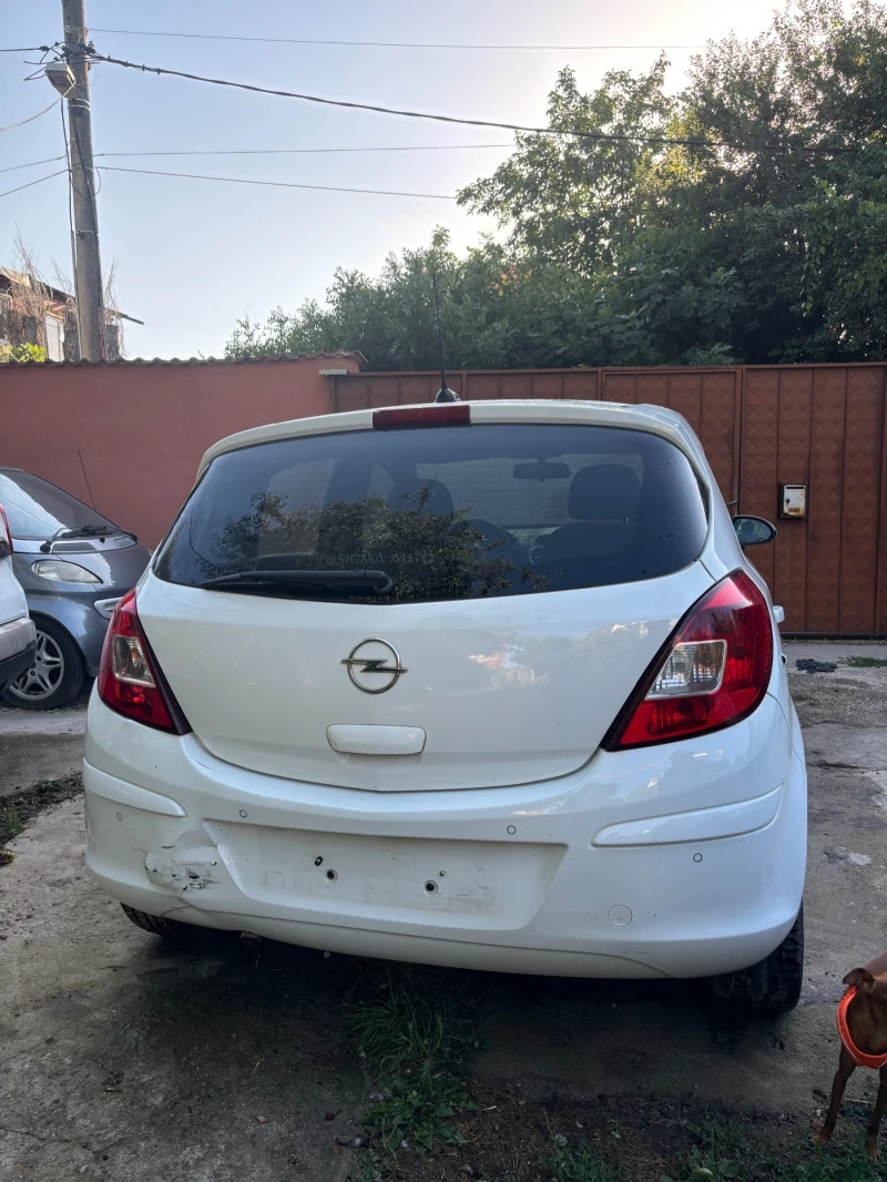 Opel Corsa газ 1.4, снимка 4 - Автомобили и джипове - 46544373