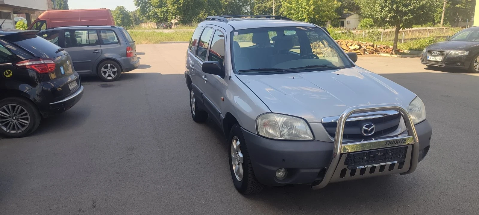 Mazda Tribute 2.0 i/4x4/ TE - изображение 5