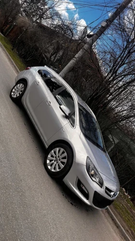 Opel Astra J Sports Tourer, снимка 1