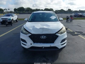 Hyundai Tucson 2l Se, снимка 13 - Автомобили и джипове - 53661686