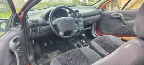 Opel Tigra 1.4i 16V - 900 € / 1760.25 лв. - 25957805 12