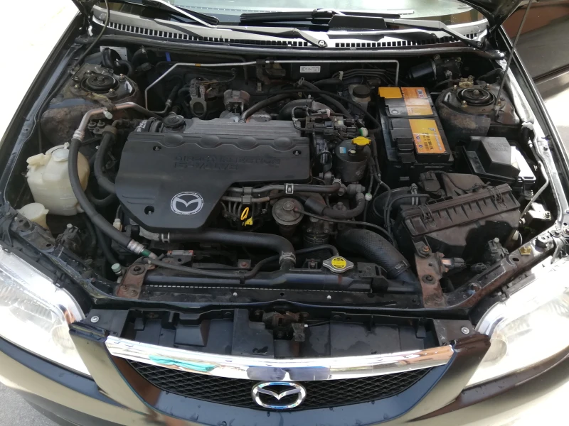 Mazda 323 2.0ditd, снимка 10 - Автомобили и джипове - 52333238