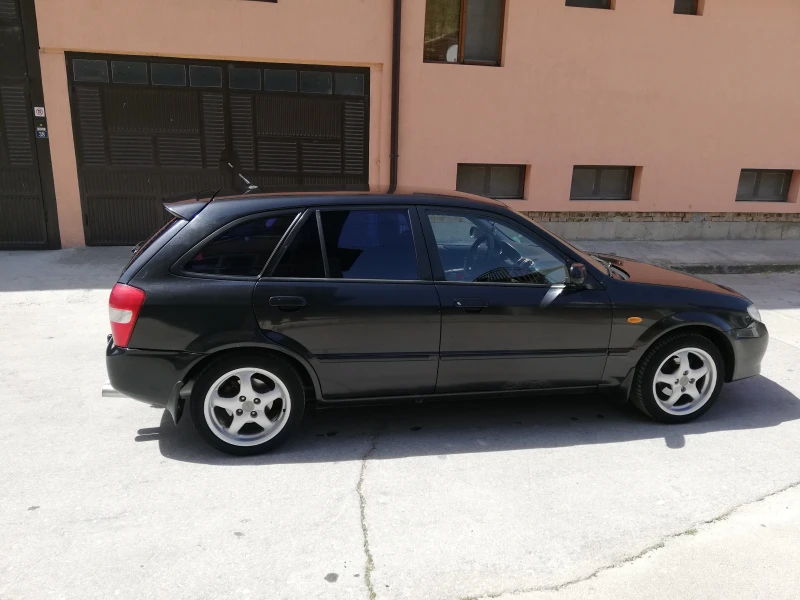 Mazda 323 2.0ditd, снимка 7 - Автомобили и джипове - 52333238
