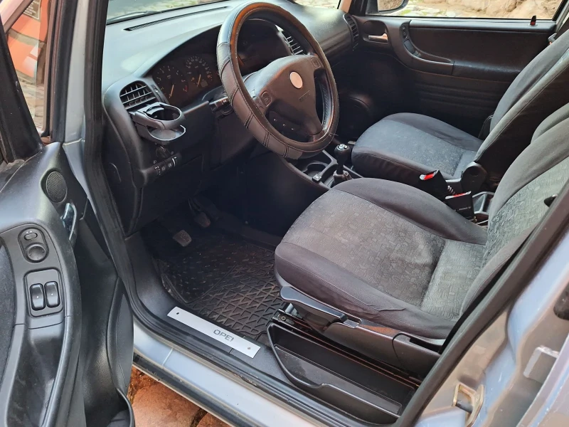 Opel Zafira 1.8 бензин със газов инжекцион , снимка 9 - Автомобили и джипове - 53076880