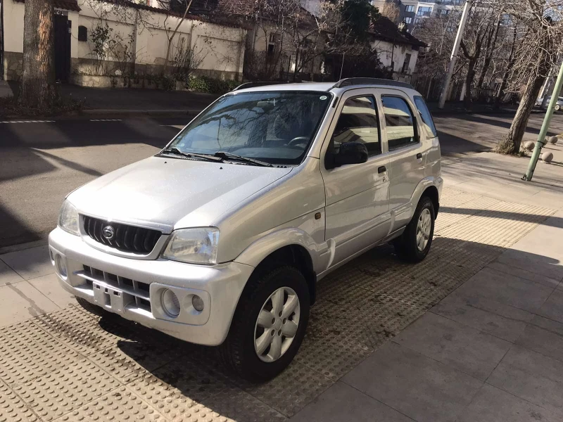 Daihatsu Terios 1.3i, снимка 6 - Автомобили и джипове - 48681780