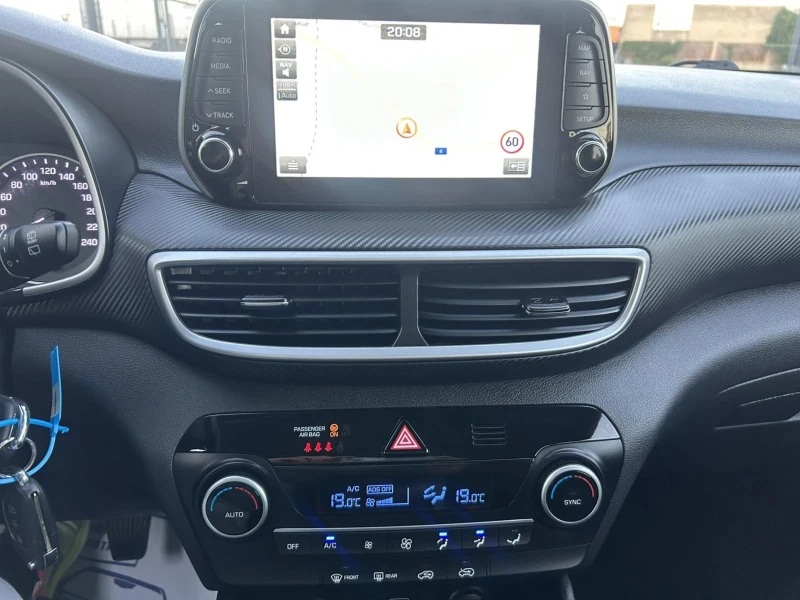 Hyundai Tucson 1.6 CRDI 116 * CAMERA * NAVI * ACC * , снимка 11 - Автомобили и джипове - 51412099