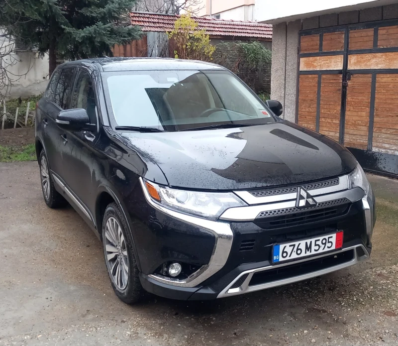 Mitsubishi Outlander 2.4SE 4x4 седем места РЕГИСТРИРАН, снимка 4 - Автомобили и джипове - 48295767