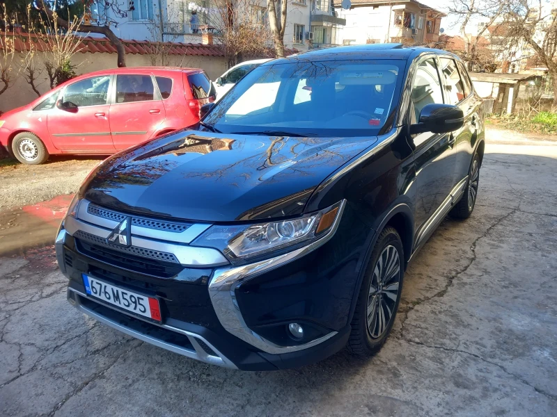 Mitsubishi Outlander 2.4SE 4x4 седем места РЕГИСТРИРАН, снимка 1 - Автомобили и джипове - 48295767