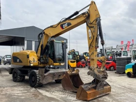 Багер Caterpillar M315D, снимка 1