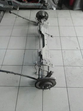 заден мост киа каренс