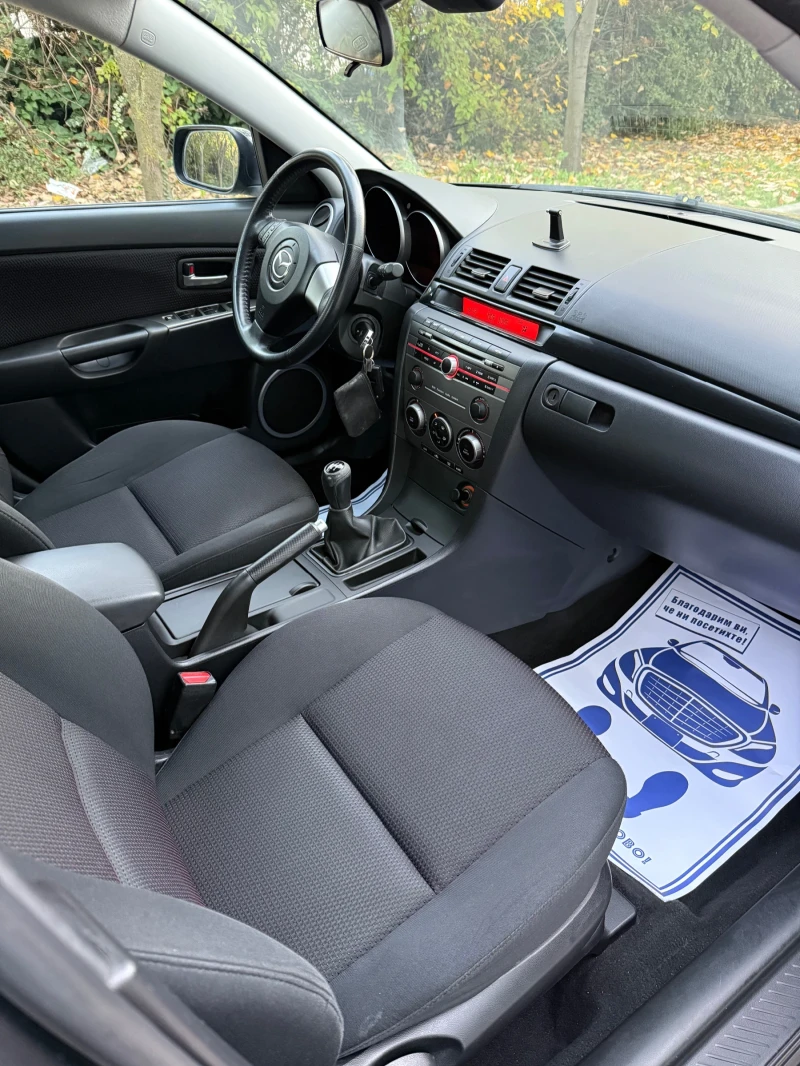 Mazda 3 1.6i Facelift, снимка 8 - Автомобили и джипове - 52449372
