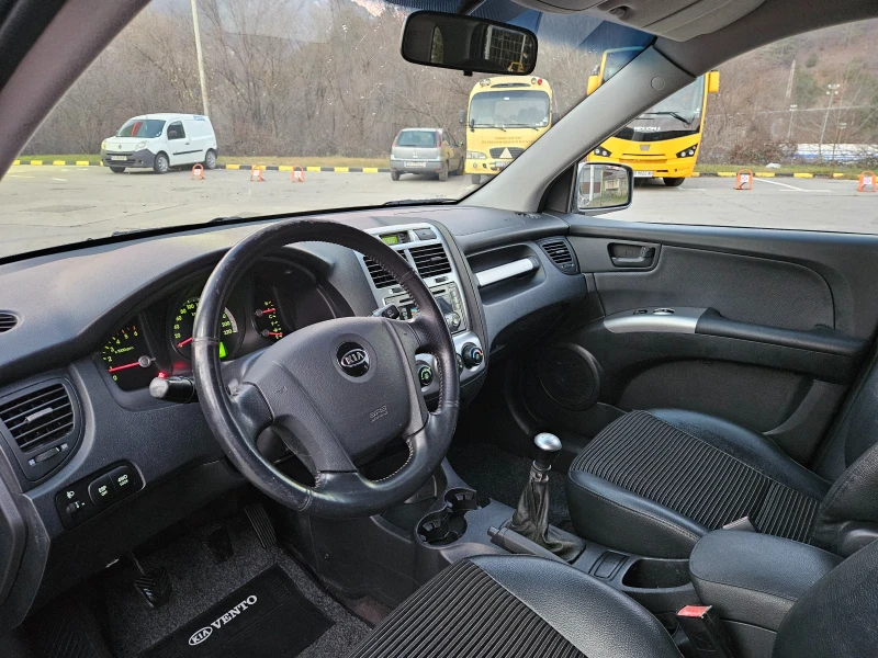 Kia Sportage 2.0 CRDI 4X4/KOJA/6skorosti, снимка 9 - Автомобили и джипове - 48502361