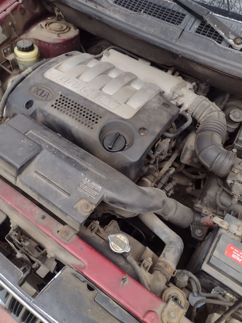 Kia Carens 1.8 i, снимка 7 - Автомобили и джипове - 53060299