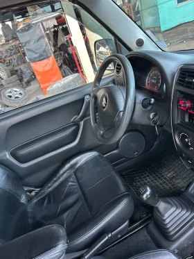 Suzuki Jimny, снимка 12 - Автомобили и джипове - 53650409