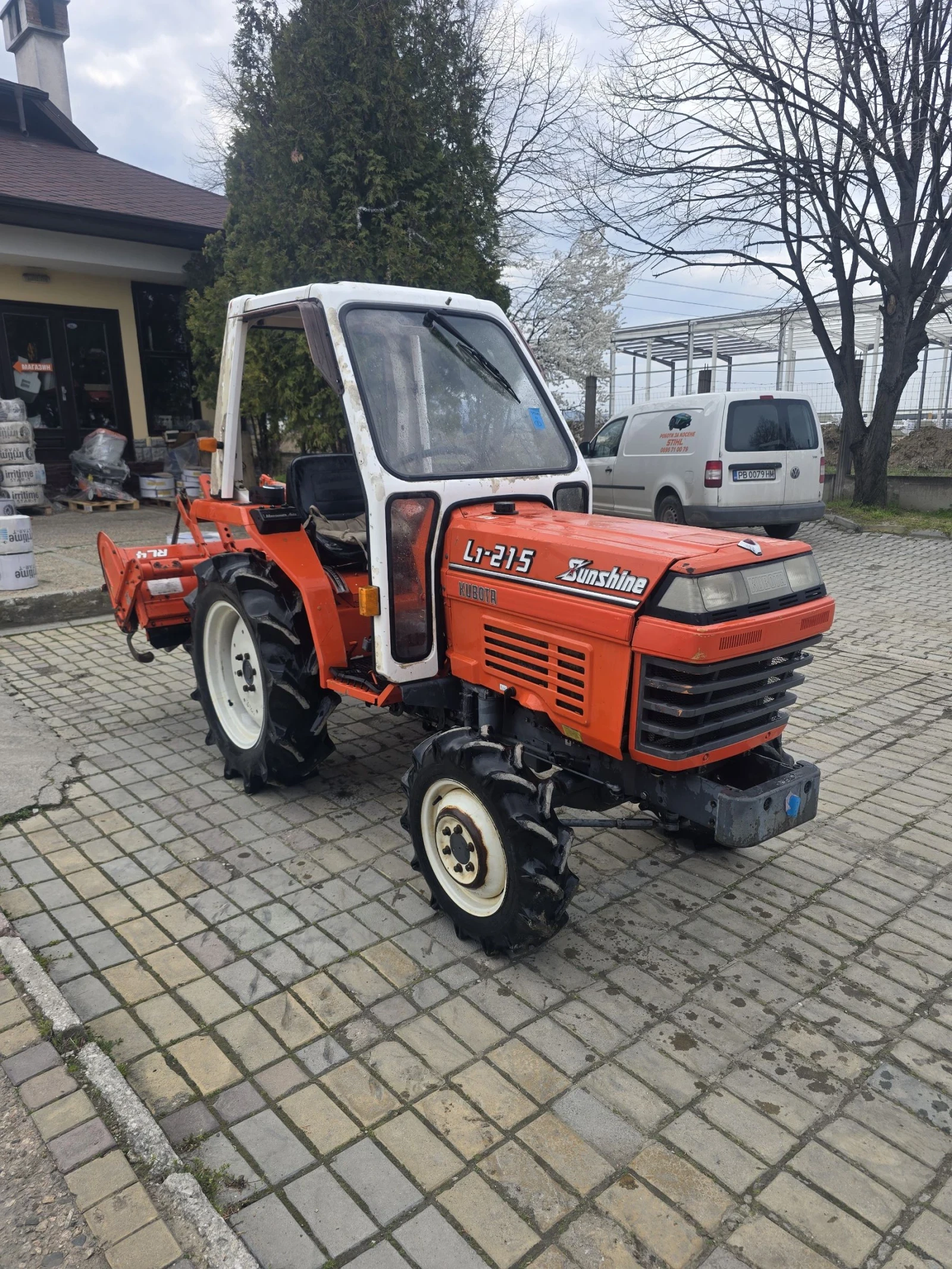 Трактор Kubota L1-215