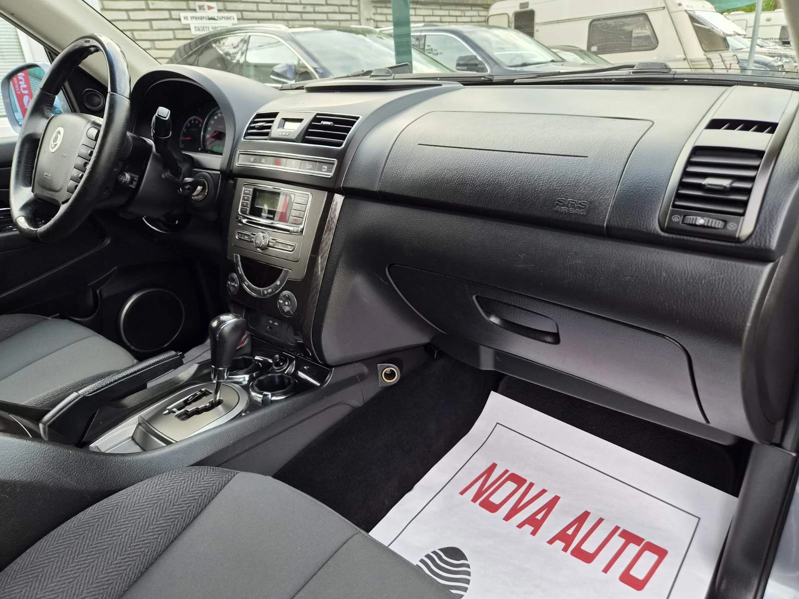 SsangYong Rexton 2.0D-AUTOMATIC-7 МЕСТА, снимка 11 - Автомобили и джипове - 55837754