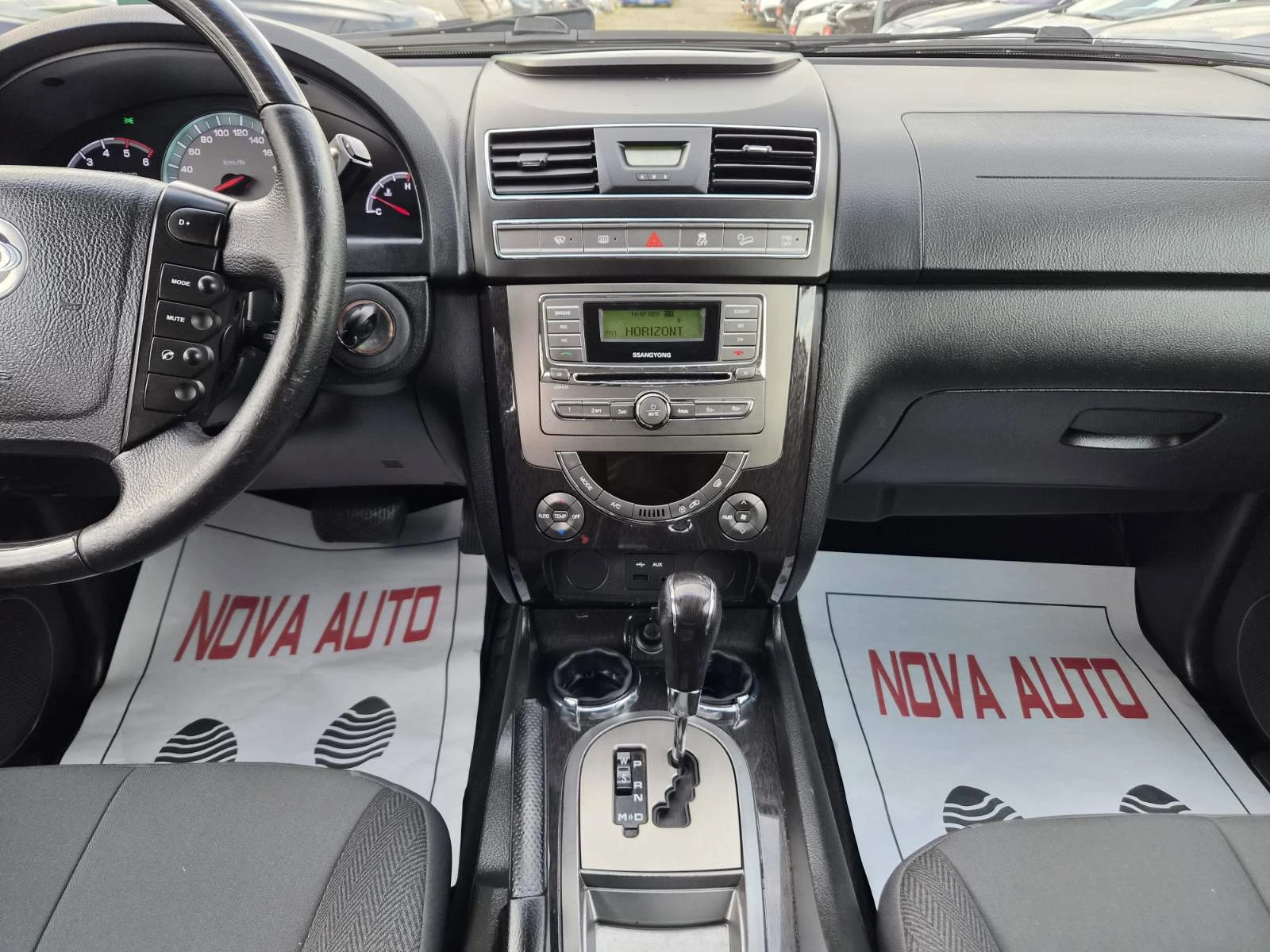SsangYong Rexton 2.0D-AUTOMATIC-7 МЕСТА, снимка 10 - Автомобили и джипове - 55837754