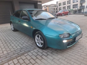 Mazda 323, снимка 1